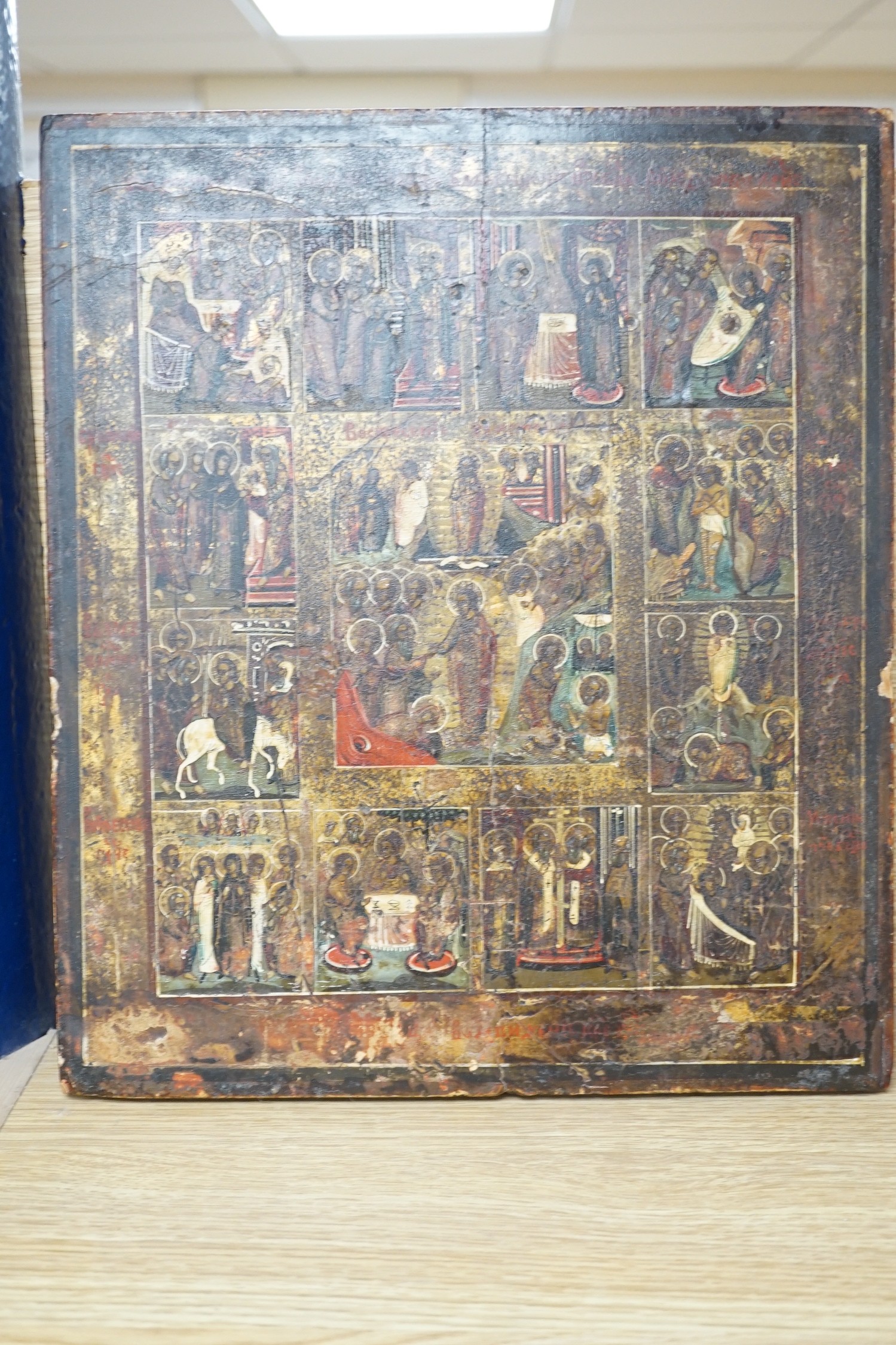 19th century Eastern European School, tempera on wooden panel, Icon with scenes from the Life of Christ, 35 x 30cm